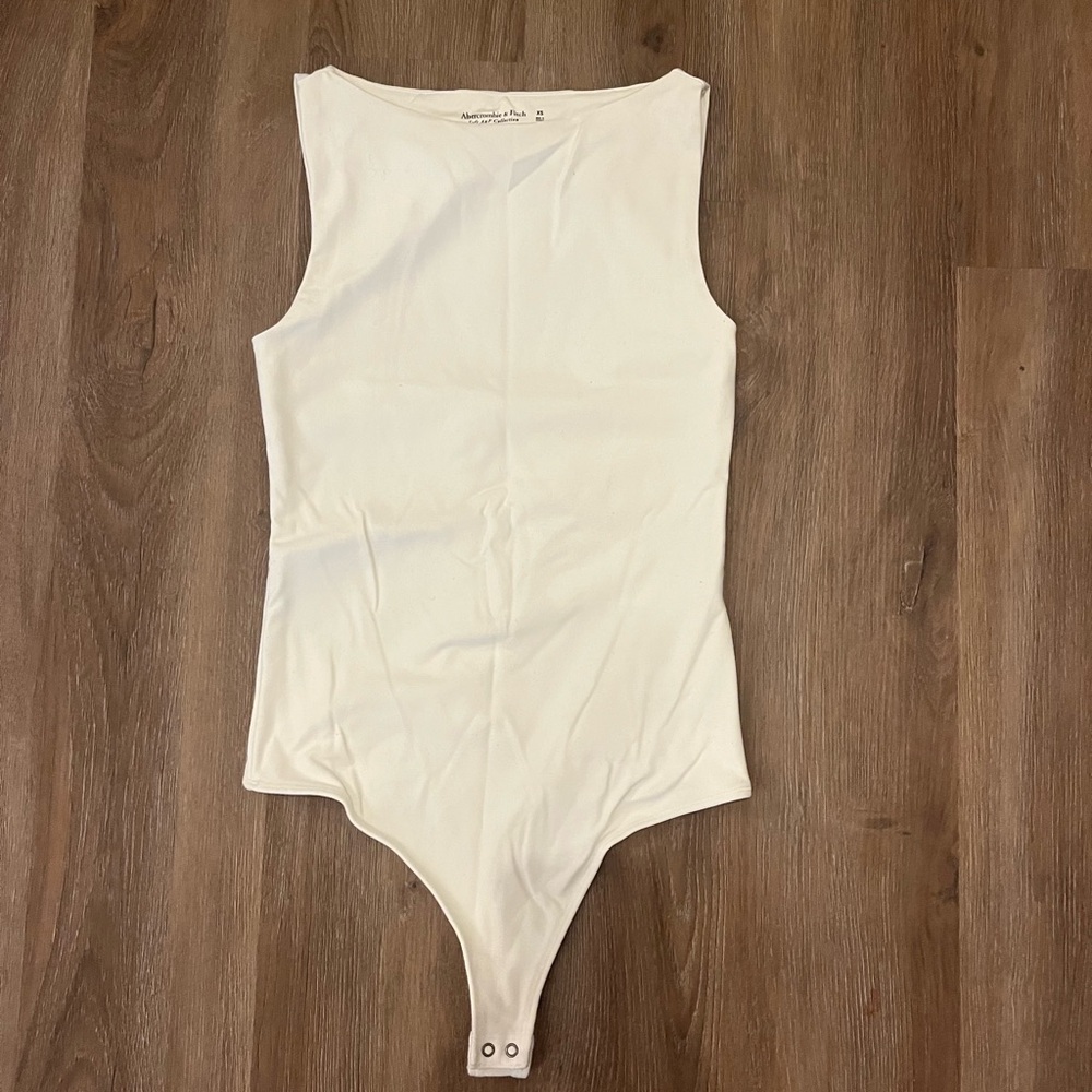 White Abercrombie and Fitch Sleeveless One-Piece Bodysuit